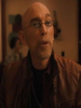 Stylish brown leather cafe racer biker jacket side profile worn by Jackie Earle Haley in The Long Game 2025