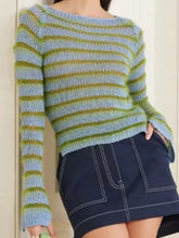 Side view of Kaitlin Olson striped knit sweater