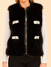 Elegant Kat Richardson black fur vest side profile fashion wear