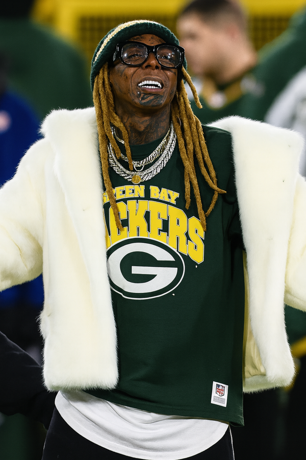 Lil Wayne wearing Green Bay Packers Detroit Lions white fur jacket