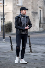 Close up detailing men’s fashion wear biker leather jacket