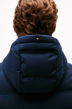 Collar closeup navy blue puffer jacket padded design