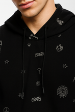 Stylish men’s black hoodie peace out streetwear outfit