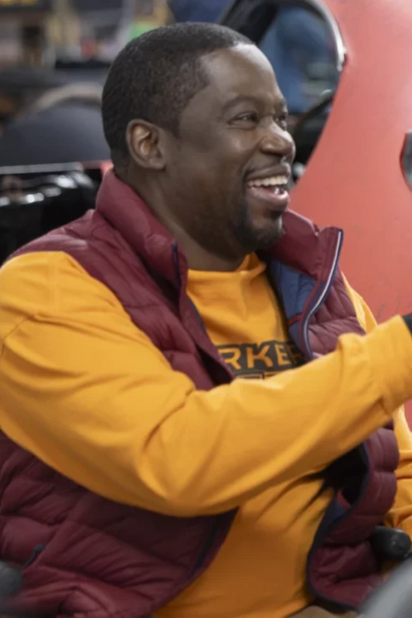 Daryl Mitchell maroon puffer vest front look from Shifting Gears S01