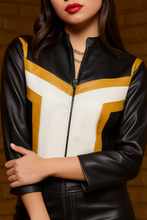 Close up of Superman 2025 Hawkgirl women cropped leather jacket with black yellow and white detailing stylish outerwear