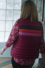 The Parenting Lisa Kudrow red puffer vest front view
