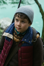 Wolf Man Zac Chandler warm padded puffer vest close up