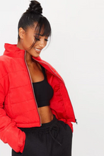 Women red puffer jacket front view