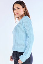 Stylish knitted sweater light blue side angle for women