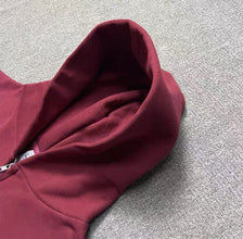 Akimbo burgundy zip up hoodie with kangaroo pockets