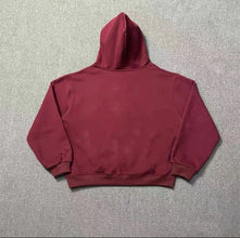 Burgundy zip up hoodie Akimbo side angle look