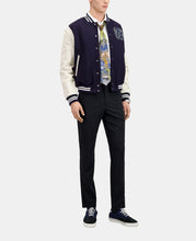 Side angle navy blue teddy jacket with patch