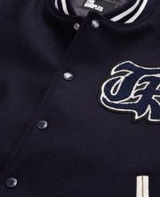 Streetwear style navy blue teddy jacket with patch