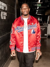model wearing ovo new era mlb montreal expos varsity jacket outfit
