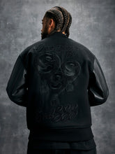model wearing ovo scarborough shooting stars championship varsity jacket