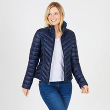 Back view reversible packable puffer jacket travel friendly