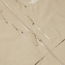 The North Face men’s beige hooded jacket zipper pockets closeup