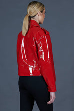 Trendy women’s short red leather biker jacket laminated design