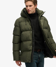 Olive green winter puffer jacket for men side angle warm padded coat
