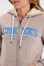 Stylish women beige hoodie side view
